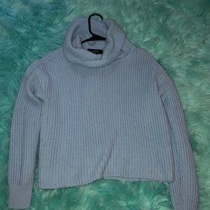 light blue turtleneck